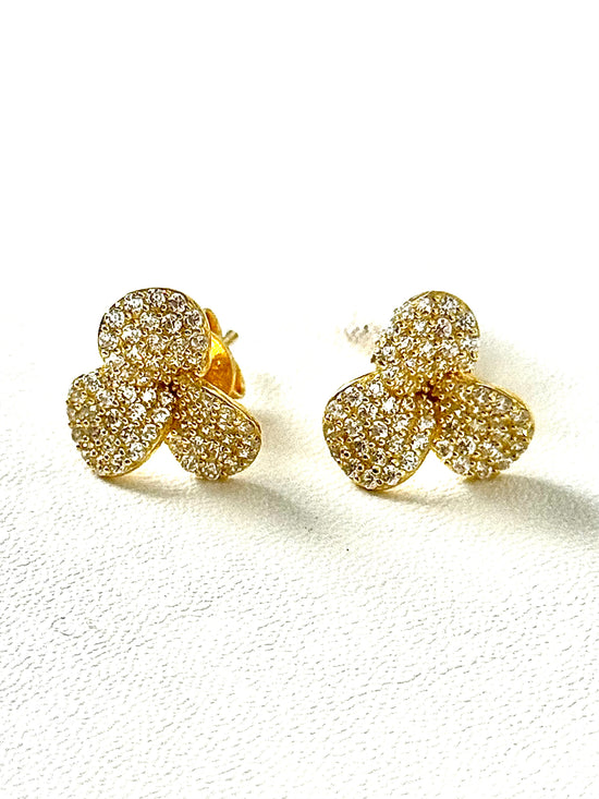 Pendientes de flor de plata dorada con circonitas