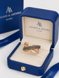 Anillo dobles brazos cruzados de oro rosa con diamantes Brown y blancos