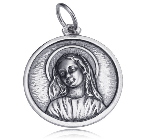 Medalla de plata de la Virgen Niña